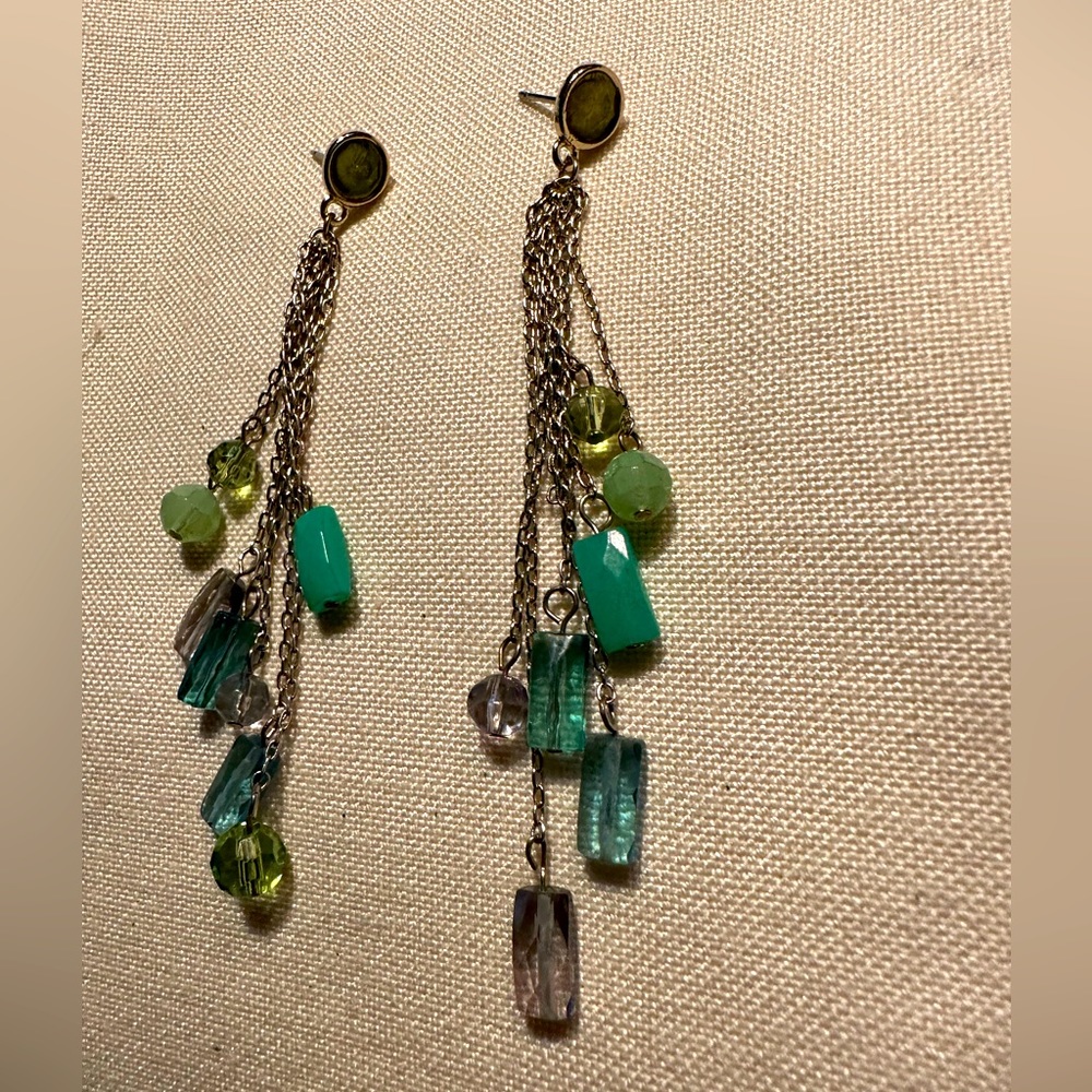 Boho but delicate, multi gold strands with colorful beading